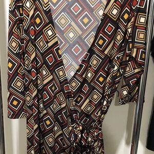 Tie waisted wrap dress. 3/4 in sleeve.